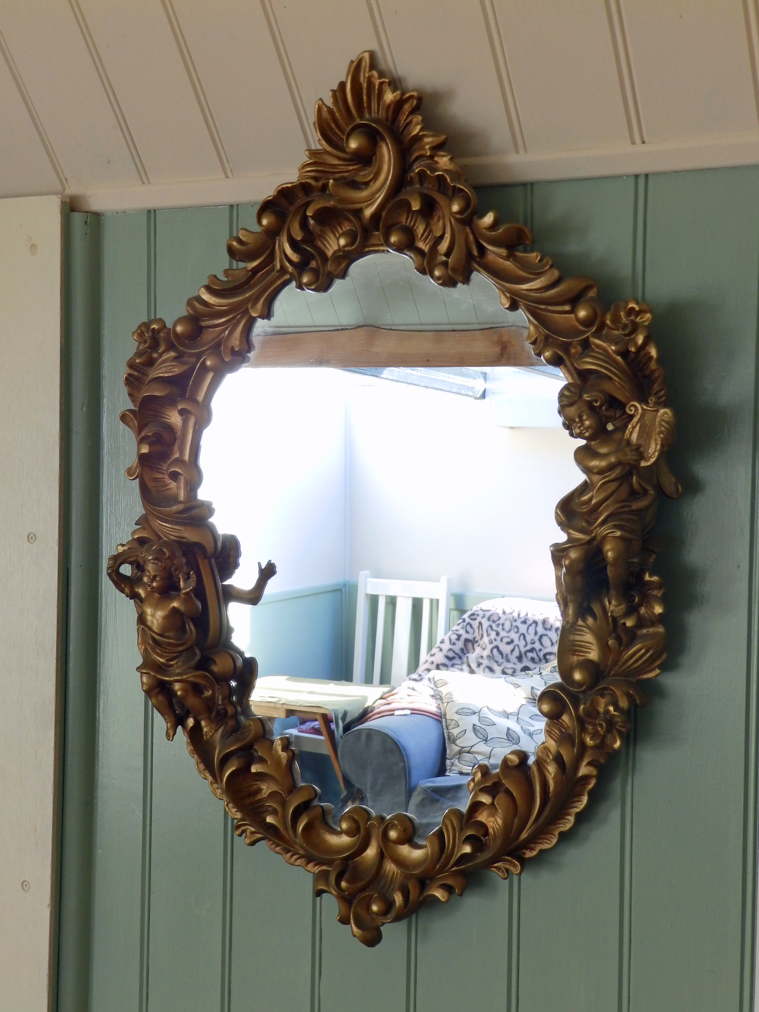 The ornate lounge mirror