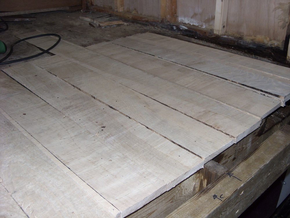 Floorboard repairs in the bedroom.