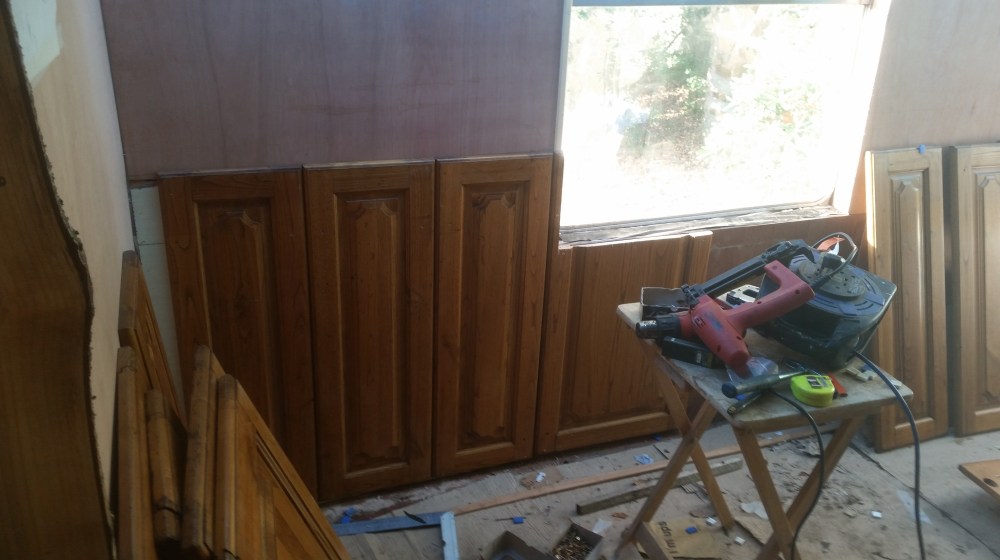 Upcycled oak panels form the pull-out extension walls