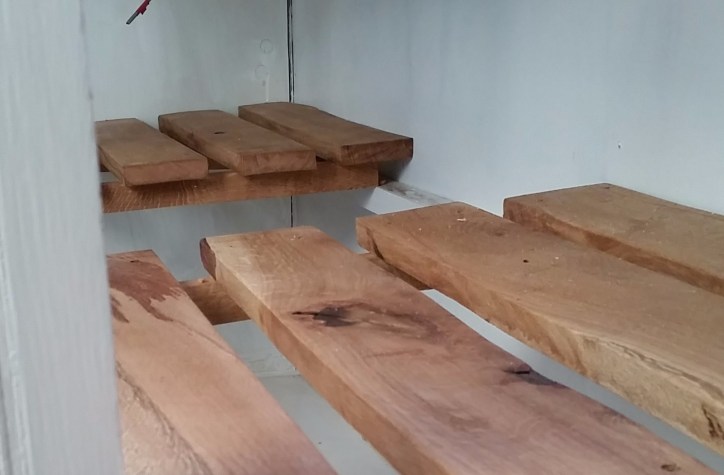 Oak shelving in the kitchen cabinets