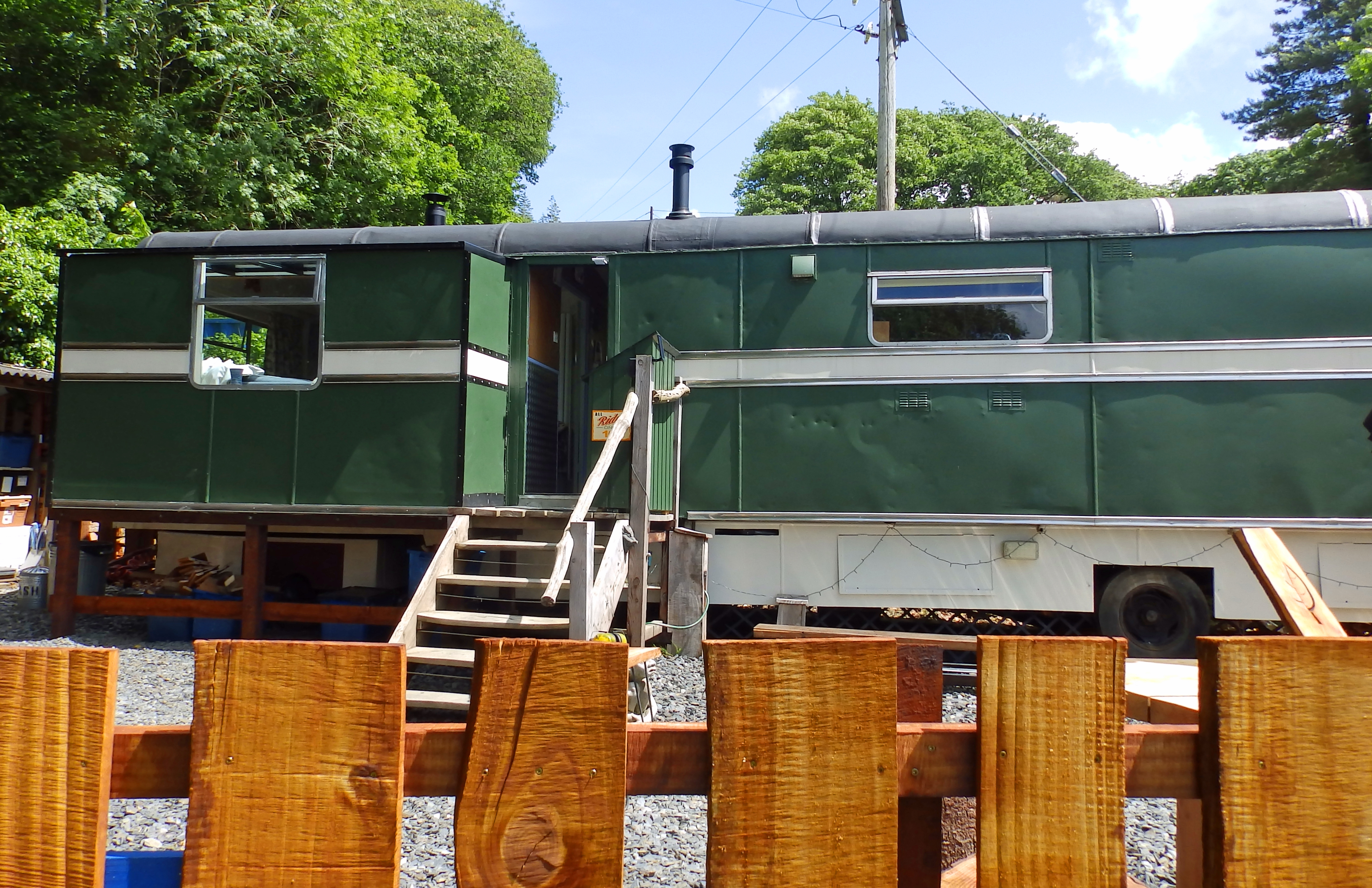 The ShowMan's Wagon from the top of the meadow.